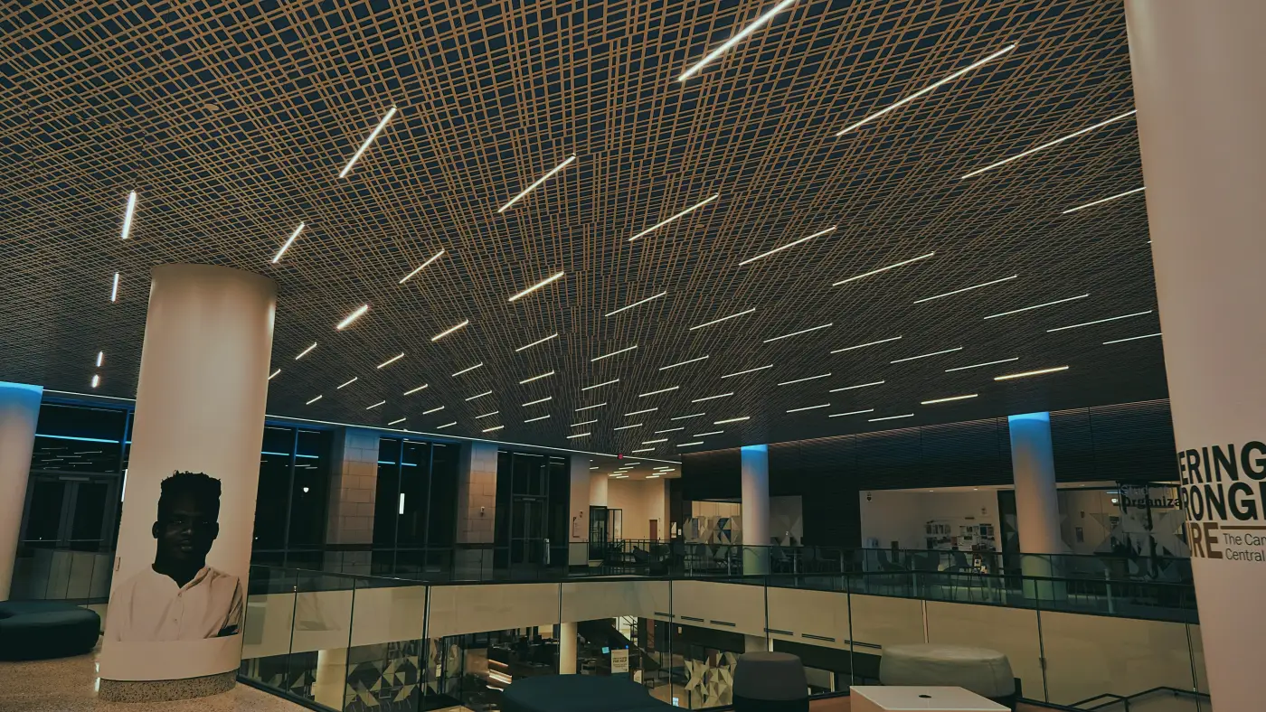 Sydney commercial office interior lit by overhead LED tube fittings replacing the original fluorescent installation