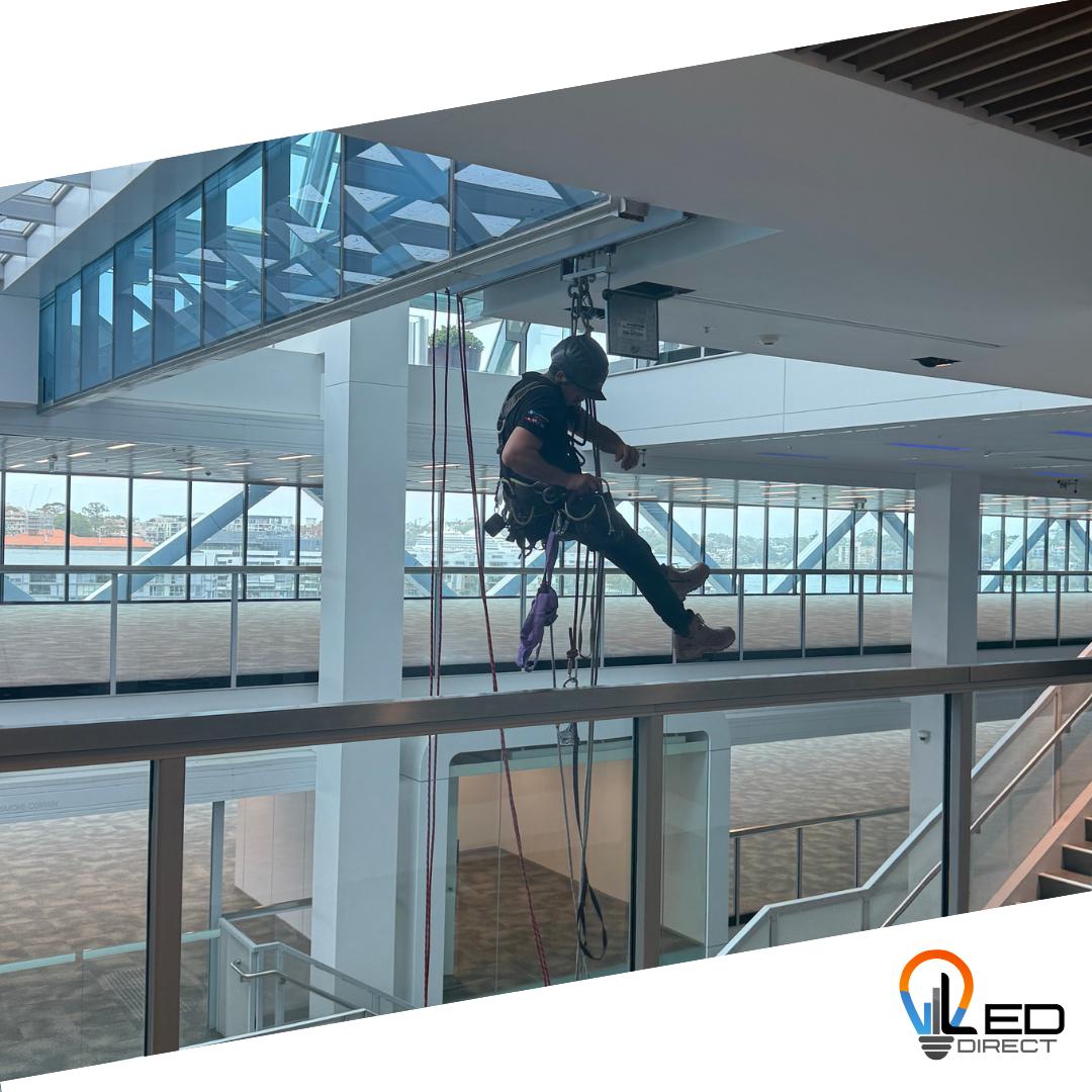 Rigger working over the lobby void